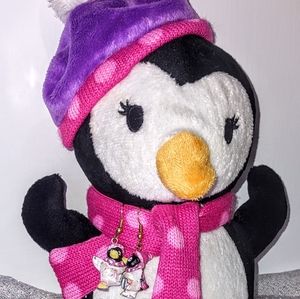 Girl's Ice Skating Penguin Earrings on Dan Dee Penguin Plush (cross-posted copy)